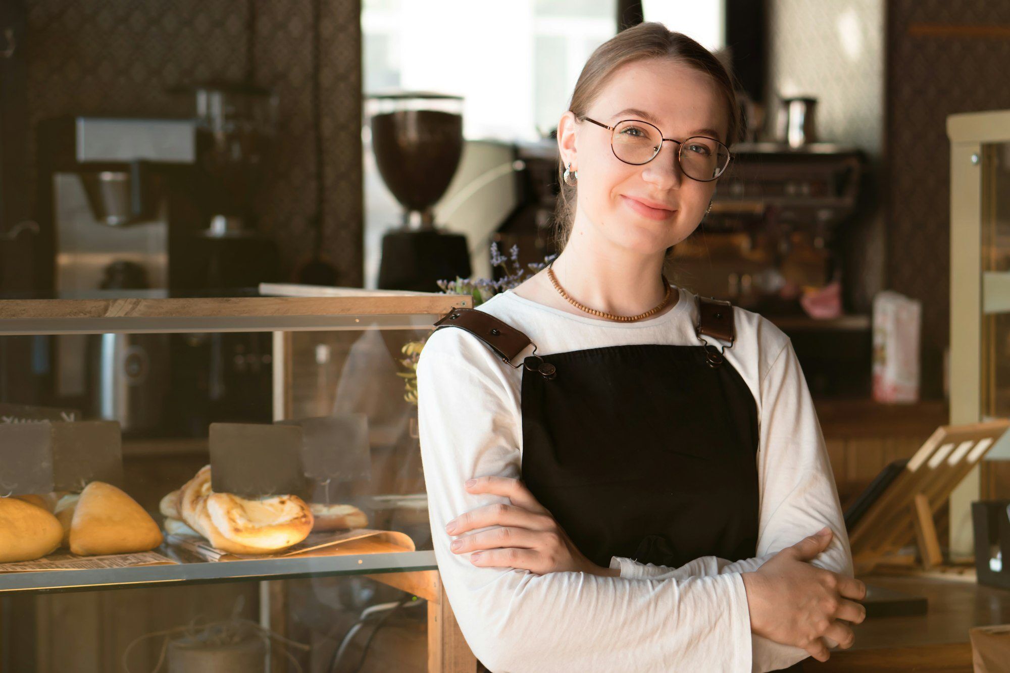 young cafe owner of waiter in coffee shop